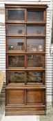 Large late 19th/early 20th century oak sectional stacking library bookcase, comprising five sections