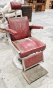 Mid-century Belmont barber's chair upholstered in red leatherette, with adjustable head rest, foot