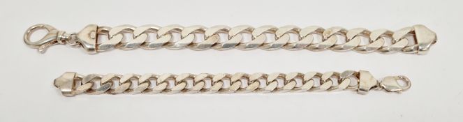 Two silver heavy curb link bracelets stamped 925, one 23.5cm long and the other 18.5cm long,
