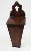 19th century mahogany candle box of square tapering form, with shaped pierced back and hinged