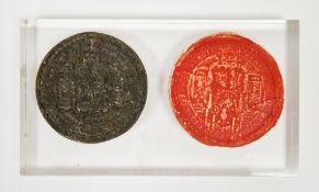 Bronze seal matrix, probably medieval, with loop to reverse, of Ecclesiastical design, 6cm