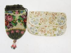 Early 20th century bead bag with floral design, draw-string top and tassel to base, 20.5cm long