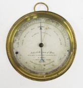 19th century brass circular cased aneroid barometer by J. Sewill of Liverpool 'maker to the Queen of