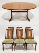 Mid-century G-Plan Fresco dining room table and six chairs, the table of oval form with interior