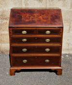Edwardian mahogany bureau, the drop sloping front with satinwood string inlay and decorated with a