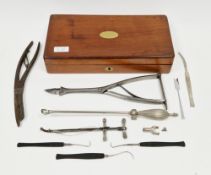 19th century mahogany box containing a selection of 19th century and later surgical instruments