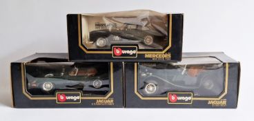 Three boxed Burago 1/18 scale diecast model cars to include 3006 Jaguar SS100 (1937), 3026 Jaguar