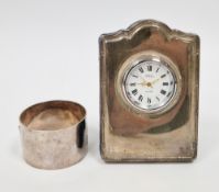 Silver fronted easel-back desk clock, Sheffield 1997, R Carr, 9cm high together with silver napkin