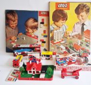 Two boxes of boxed and loose Lego sets to include Lego System 260, 324, 604, 886, 799, Playmat and