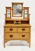 Early 20th century Arts & Crafts oak dressing table, the upper section with a rectangular swing