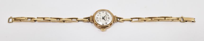 9ct gold Veranda lady’s watch, the silver dial with Arabic numerals, on a stretch link bracelet