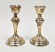 Pair of silver candlesticks, Birmingham 1965, W I Broadway & Co, with ringed sconces, knops and