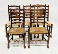 Set of five oak Lancashire-style ladderback dining chairs with rush seats (including one carver), on