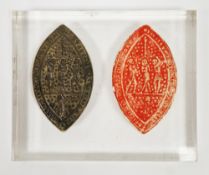 Bronze seal matrix, possibly medieval, elliptical with loop to reverse, depicting three figures, 7cm