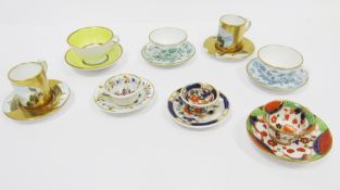 Group of English porcelain miniature tea and coffee cups and saucers, late 19th/early 20th