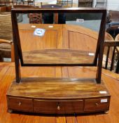 19th century mahogany swing dressing mirror, the rectangular plate on reeded supports with brass