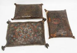 Three antique leather cushions, possibly Spanish 16th or 17th century, having tooled and painted