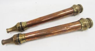 Two Morris Patent style copper and brass fire hose nozzles, both stamped 3/4, 56.5cm long