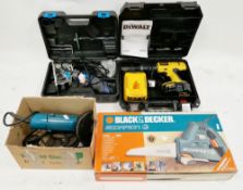 Black and Decker Scorpion powered saw, a Makita angle grinder, a DeWalt cordless drill and an