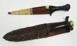World War II Taylor Eye Witness fighting knife with double edge and leather scabbard, 28cm long