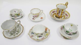 Collection of German and continental porcelain miniature teacups and saucers, late 19th/20th