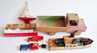 Vintage wooden children's toys to include wooden Brio trains and track, wooden soldier, reversible