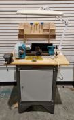 Axminster C1 MKII model engineer's micro lathe on grey steel cabinet, bench vice, wooden tool rack