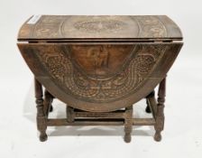 17th century or later oak oval gateleg table, the top with central panel carved with a phoenix and