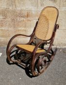 Thonet-style bentwood rocking chair with cane back and seat (seat damaged), 100cm high x 52cm wide x