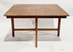 Mid-century McIntosh teak rectangular dining table, the top extending with a pull-up flap, on a