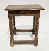 Antique oak joint stool, having a rectangular pegged top above a lunette carved frieze, on turned