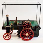 D.R. Mercer live steam traction road locomotive in glazed display case, with handbook and