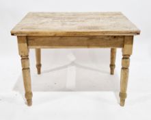 Early 20th century pine kitchen table, the rectangular scrub top over a single drawer to end with