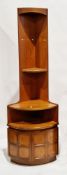 Mid-century Nathan teak tall corner cabinet with two shelves over a deeper shelf and two cupboard