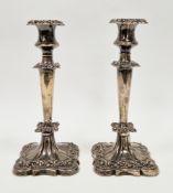 Pair of Edward VII silver candlesticks, Birmingham 1906, W G Keight, rococo revival with embossed