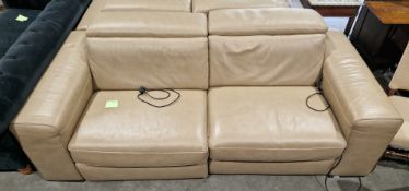 Italian Natuzzi brown leather upholstered two-seater reclining sofa formed in two sections, with
