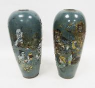 Pair of late 19th/early 20th century Japanese blue ground tapering oviform vases, each painted