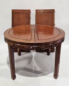 Chinese hardwood dining room suite comprising an oval extending dining room table with two