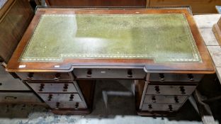 Victorian mahogany twin-pedestal desk of inverted breakfront form, the top with ogee moulded edge,