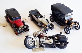 Four unboxed Franklin Mint Precision Models to include Harley- Davidson Heritage Softail Classic,