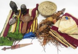Collection of ethnic items including an African hide quiver and arrows, the quiver having a fringe