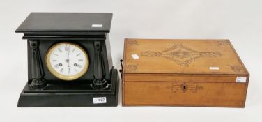 Victorian slate mantel clock of architectural form, the white enamel face with two winding holes and