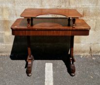 19th century mahogany table, the rectangular top with rounded corners, on two solid supports with
