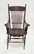 American-style Arts & Crafts elm seated elbow chair, the high back with turned finials, deep back