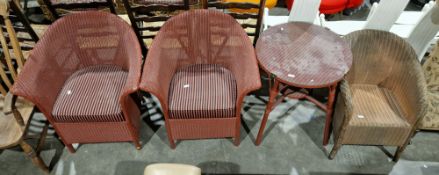 Pair of early 20th century Lloyd Loom tub chairs having a red brown finish and striped upholstered