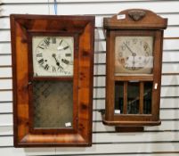 Early 20th century oak hanging wall clock, the dial with two winding holes and Arabic numerals, with