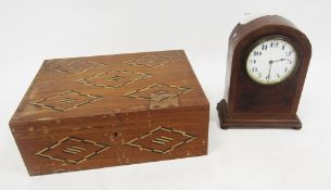 Early 20th century mahogany and walnut cased dome top mantel clock, the white enamel face with