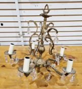 Mid-20th century gilt brass five-branch electrolier in the rococo manner, with prismatic glass