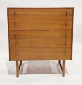 Mid-century Alfred Cox teak chest of five long drawers with moulded wooden handles, on square legs