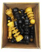 Turned ebony and boxwood St George pattern chess set of graduated disc design, the king's with